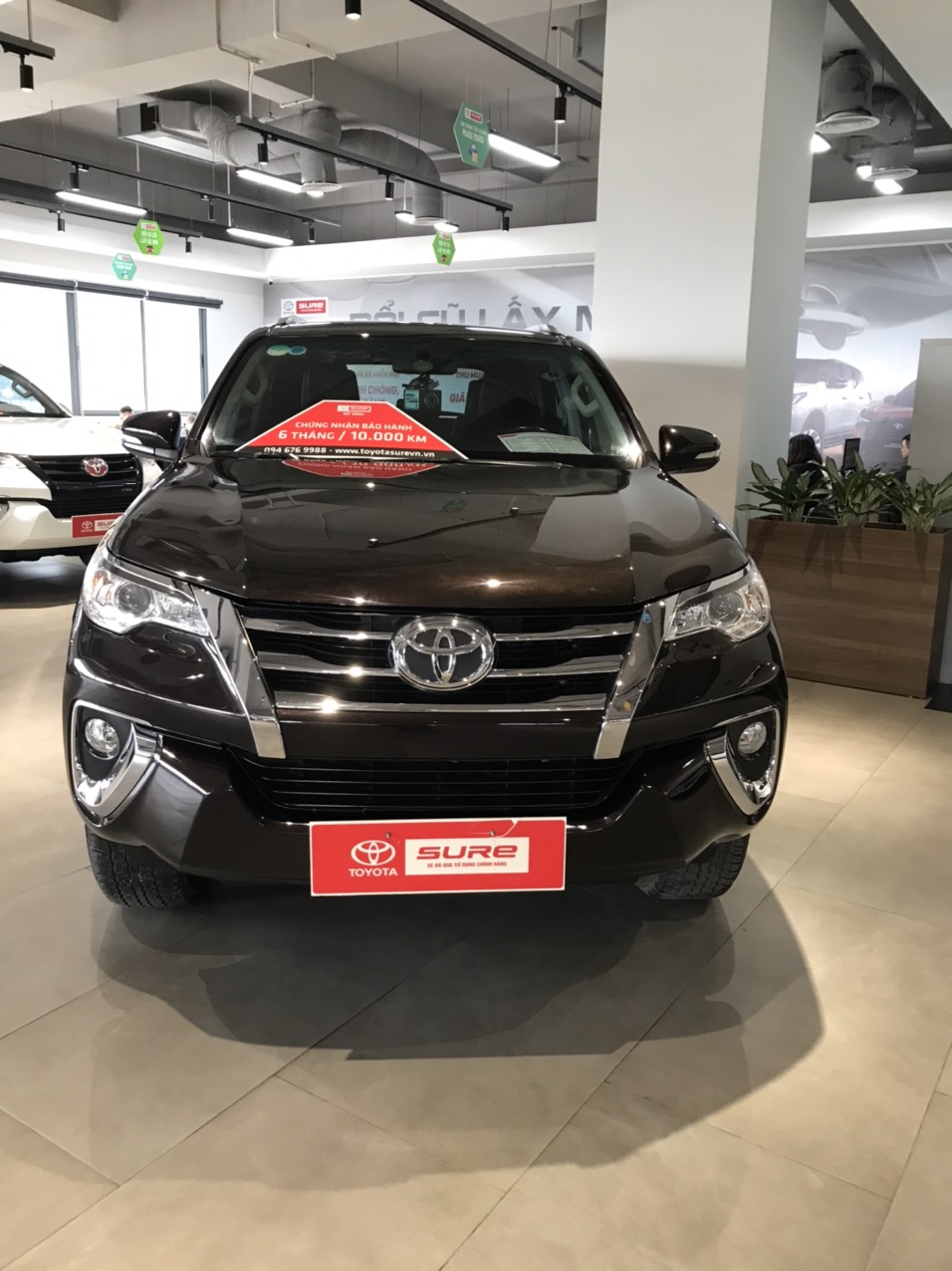 xe Fortuner cũ màu đen tại Toyota Sure Mỹ Đình